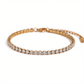 Brățară tennis din oțel inoxidabil placat cu aur 18K, cu zirconiu cubic de 3 mm, de la Miagini, pe încheietura mâinii.