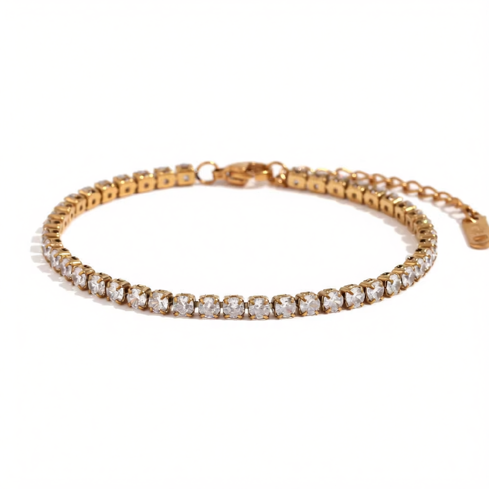 Brățară tennis din oțel inoxidabil placat cu aur 18K, cu zirconiu cubic de 3 mm, de la Miagini, pe încheietura mâinii.
